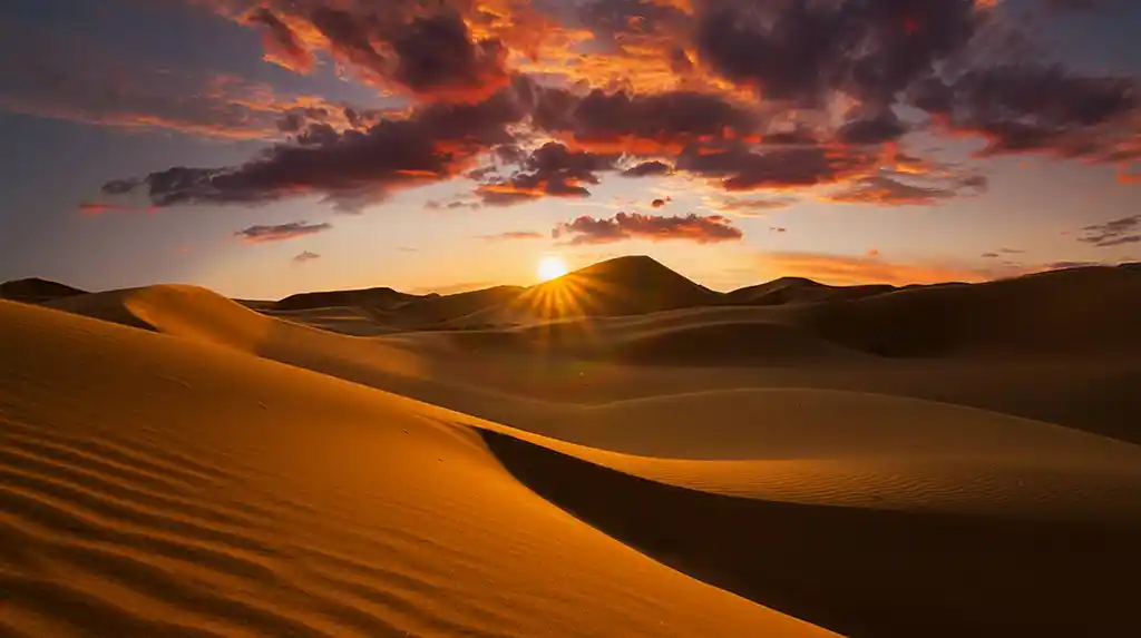 Coucher de soleil sur le désert du Sahara